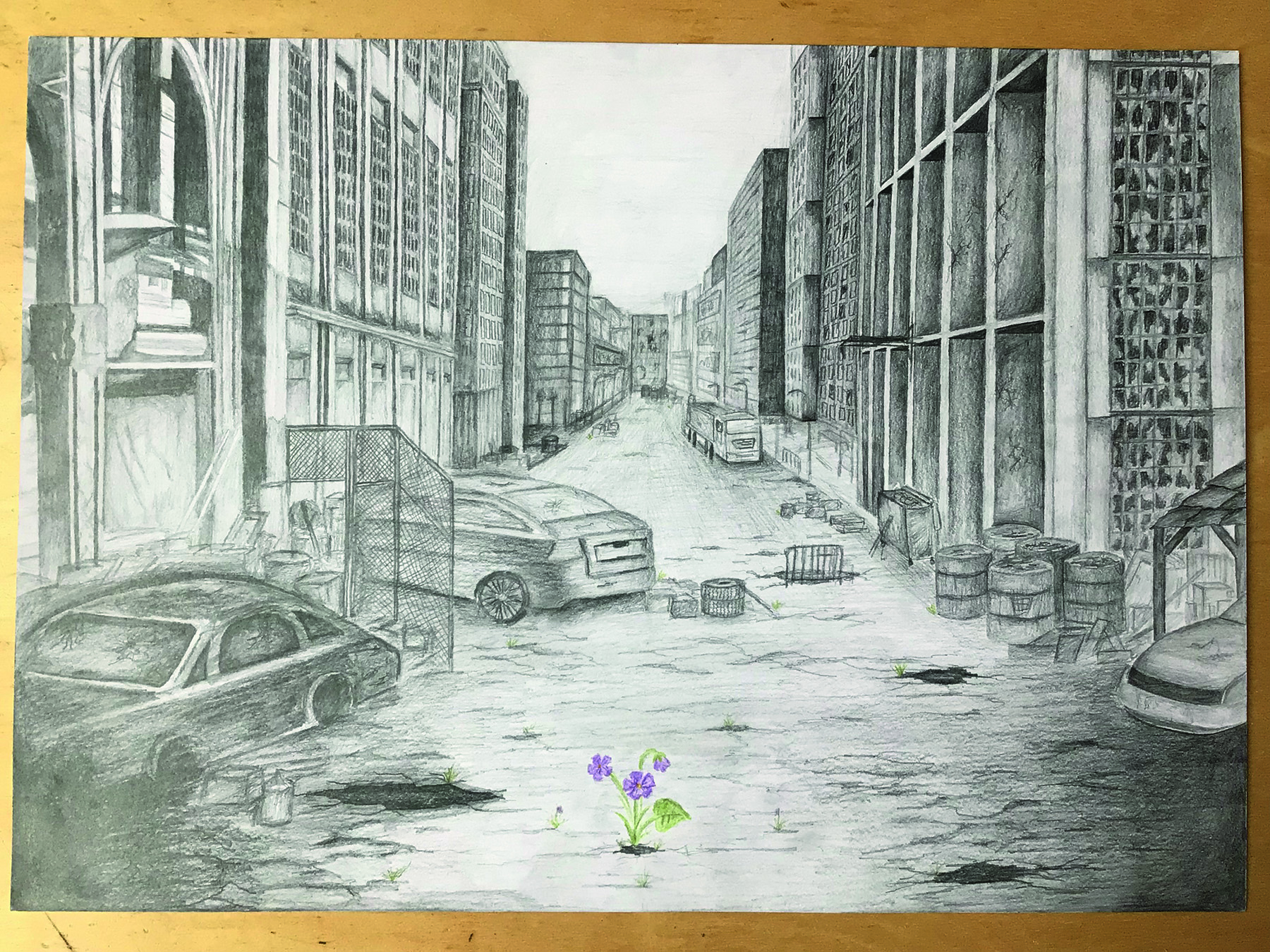 Blumen mitten in einer Stadt voller Beton und Autos